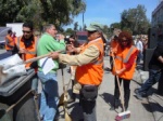 Osman Alkas and Hatice Tezcan cleaning Nicosia while Yiltan Tasci sings